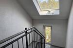 Helle 2 Zimmer Dachgeschoßwohnung mit Balkon und Tiefgaragenplatz