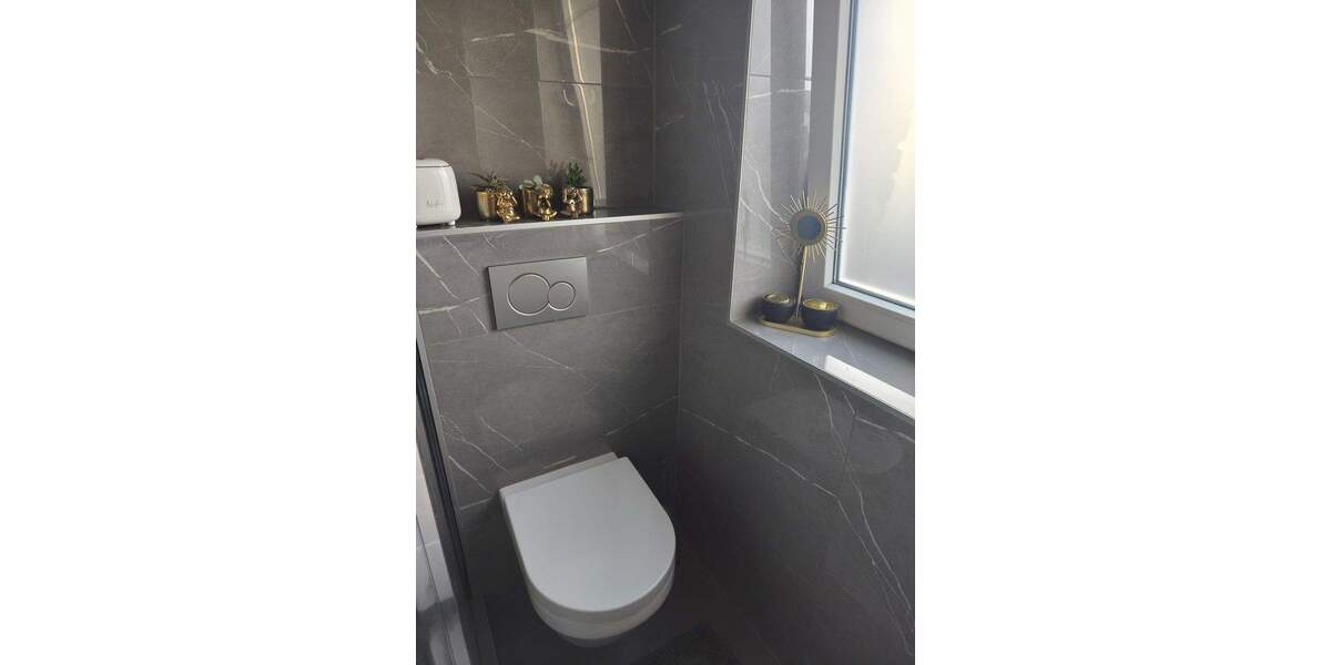 Lichtdurchflutete Wohnung mit Garage, Kamin und eigenem Garten im freistehendem Haus 3 zimmer