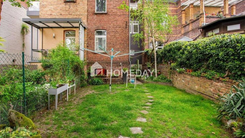 Altbau-Mehrfamilienhaus mit 6 Wohneinheiten und gemeinschaftlichem Garten