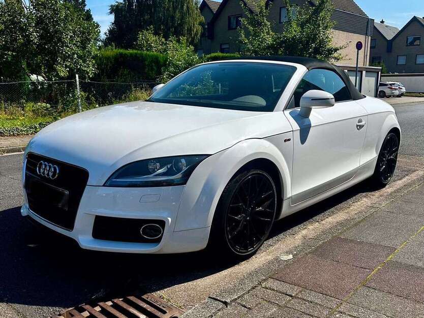 TT