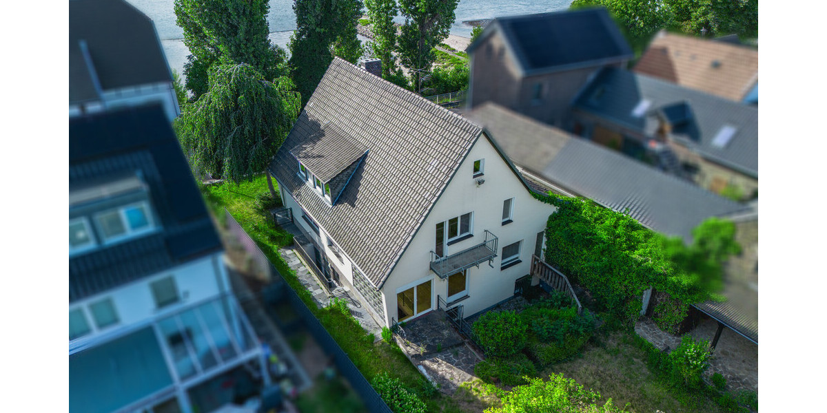 Rheinblick, Gartenidylle und Entwicklungspotential - Einfamilienhaus Köln Porz | Angebot:25783620