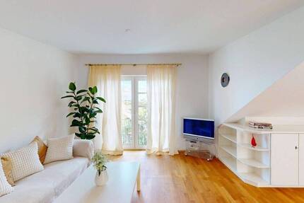 Charmante Eigentumswohnung mit Terrasse, Ankleideraum und Garage