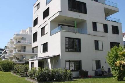 Traumhafte Erdgeschoss Terrassen Wohnung mit seitlichem Rheinblick