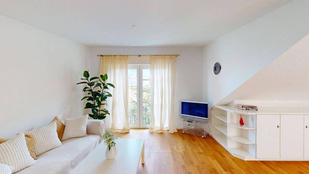 Charmante Eigentumswohnung mit Terrasse, Ankleideraum und Garage