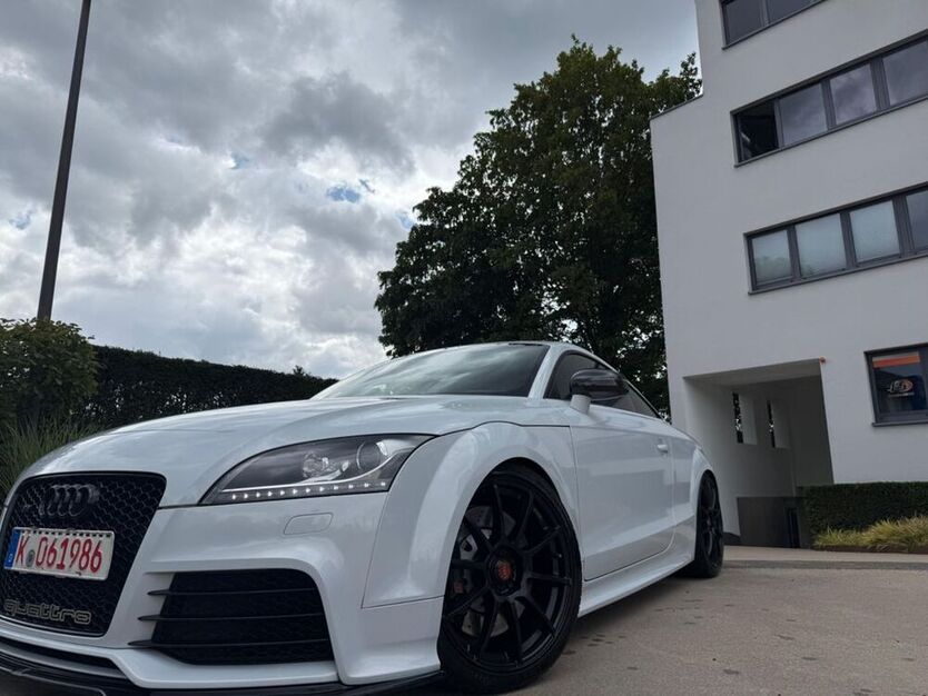 TT