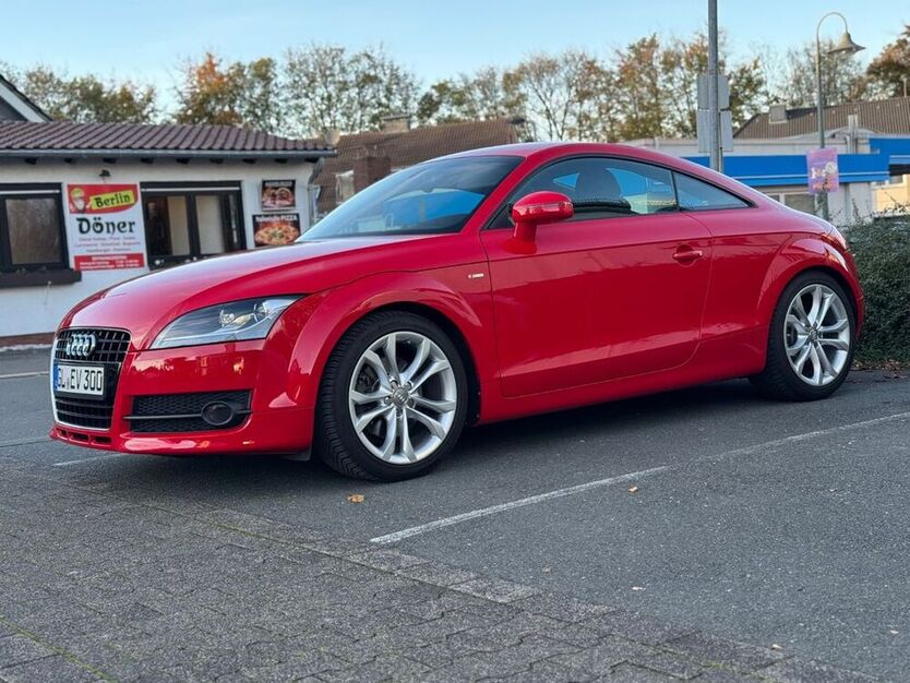 TT