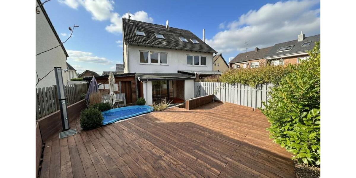 Charmante Doppelhaushälfte mit Wintergarten, Garten und vielseitigen Nutzungsmöglichkeiten 5 zimmer