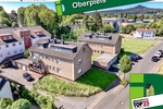 Oberpleis: 2 Mehrfamilienhäuser mit insg. 12 Wohnungen und 8 Garagen