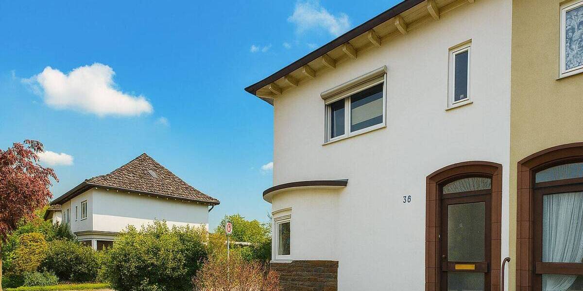 Charmante Doppelhaushälfte mit Südgarten und Carport 4 zimmer