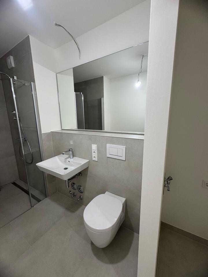 Exklusive teilmöblierte 2-Zimmer Neubauwohnung - 150m zum Rhein zimmer