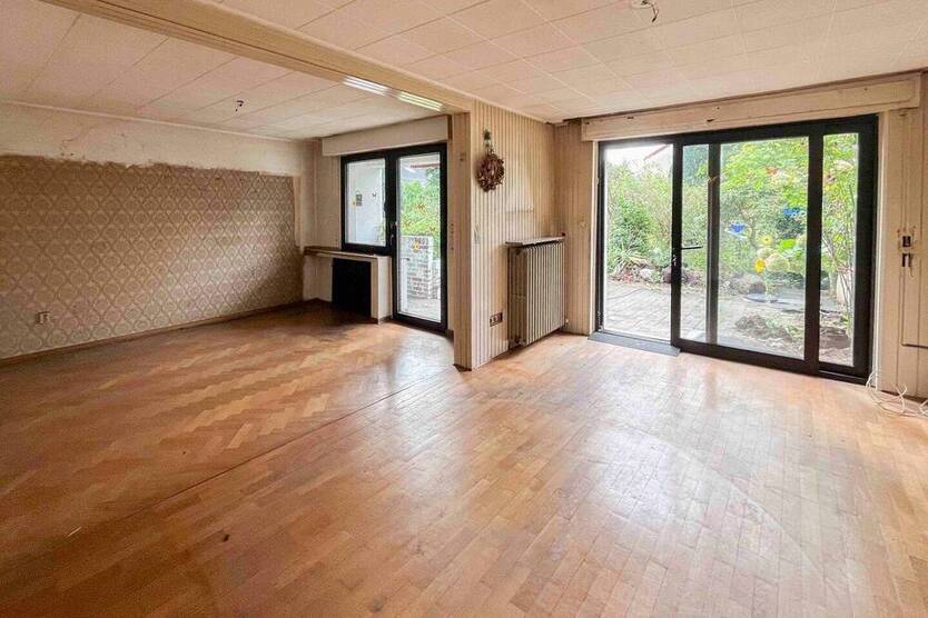 Reihenendhaus mit großem Garten und Garage in Toplage - bereit für Ihre Ideen!