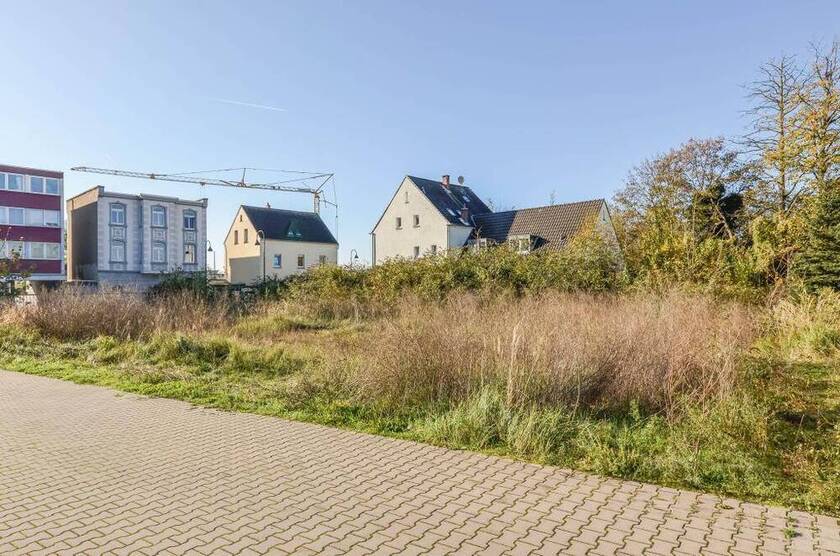 Baugrundstück für Wohn-Geschäftshaus in Küppersteg * direkte S-Bahnnähe * Baugenehmigung liegt vor