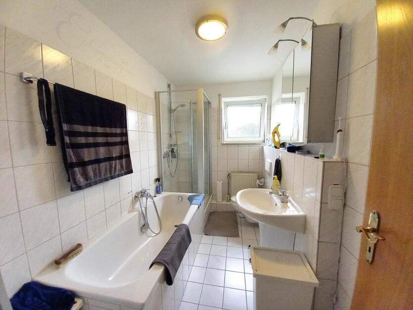 CITYHOUSE: Mehrfamilienhaus solide vermietet mit großem Garten, Keller, Stellplatz und Garage 9 zimmer