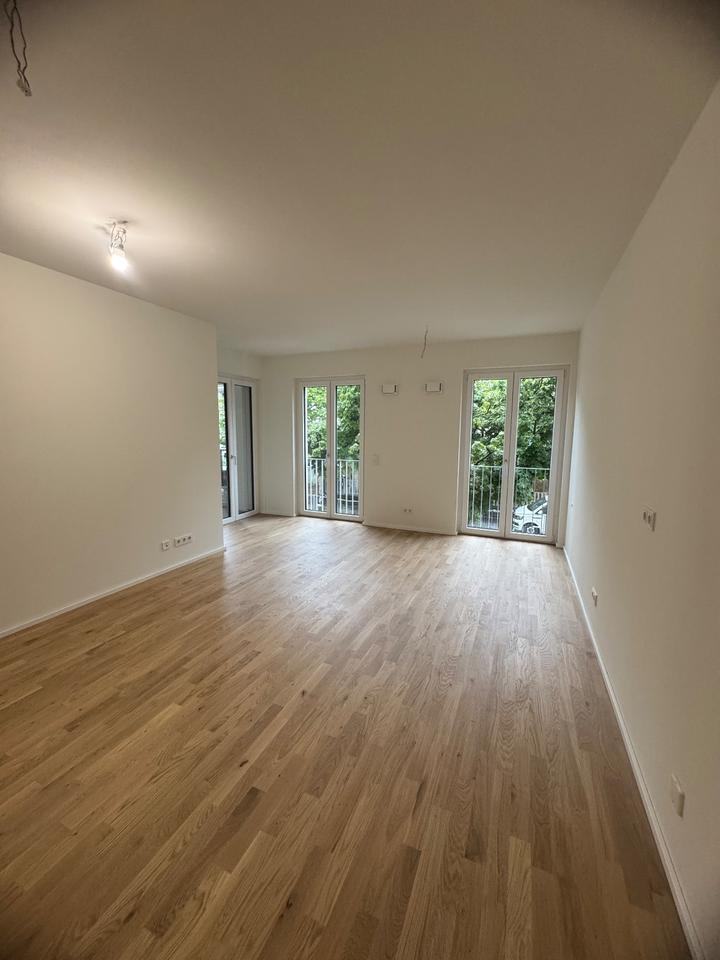 Exklusive teilmöblierte 2-Zimmer Neubauwohnung - 150m zum Rhein zimmer