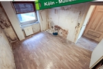 Entkernte Erdgeschoss-Wohnung mit eigenem Garten