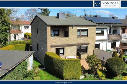 Geräumiges Reihenendhaus auf wunderschönem Grundstück mit zwei Garagen