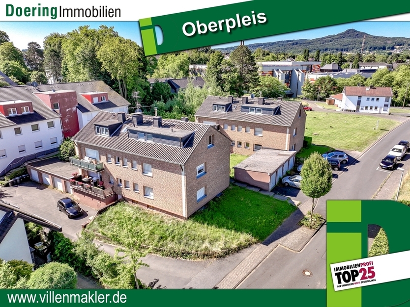 Oberpleis: 2 Mehrfamilienhäuser mit insg. 12 Wohnungen und 8 Garagen