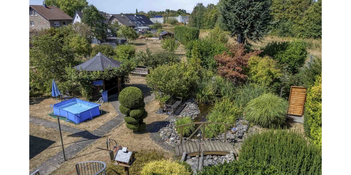 Echtes Raumwunder auf großem Sonnen-Grundstück in guter Wohnlage. Hier ist flexible Nutzung möglich! - Zweifamilienhaus Weilerswist | Angebot:27317017
