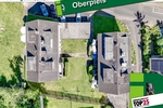 Oberpleis: 2 Mehrfamilienhäuser mit insg. 12 Wohnungen und 8 Garagen