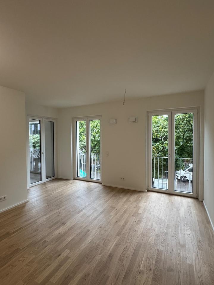 Exklusive teilmöblierte 2-Zimmer Neubauwohnung - 150m zum Rhein zimmer