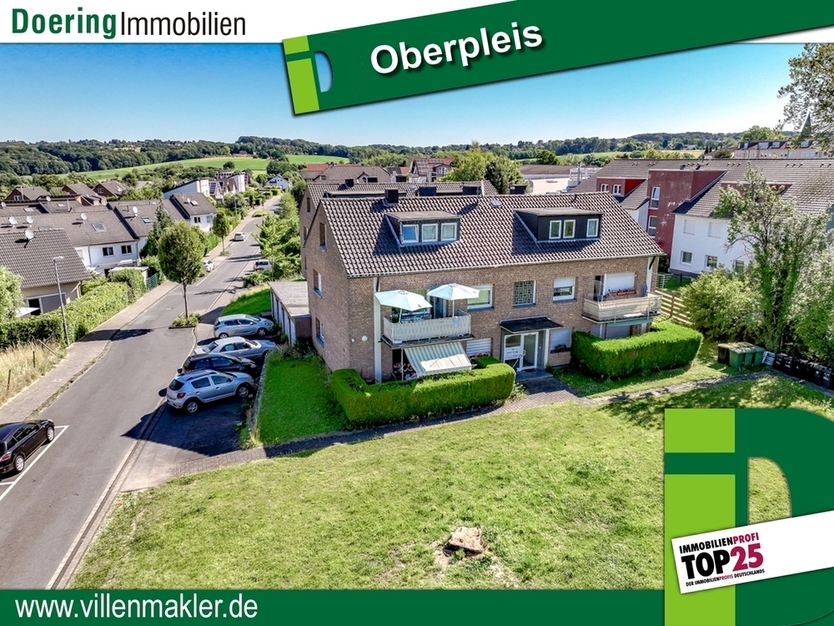Oberpleis: 2 Mehrfamilienhäuser mit insg. 12 Wohnungen und 8 Garagen