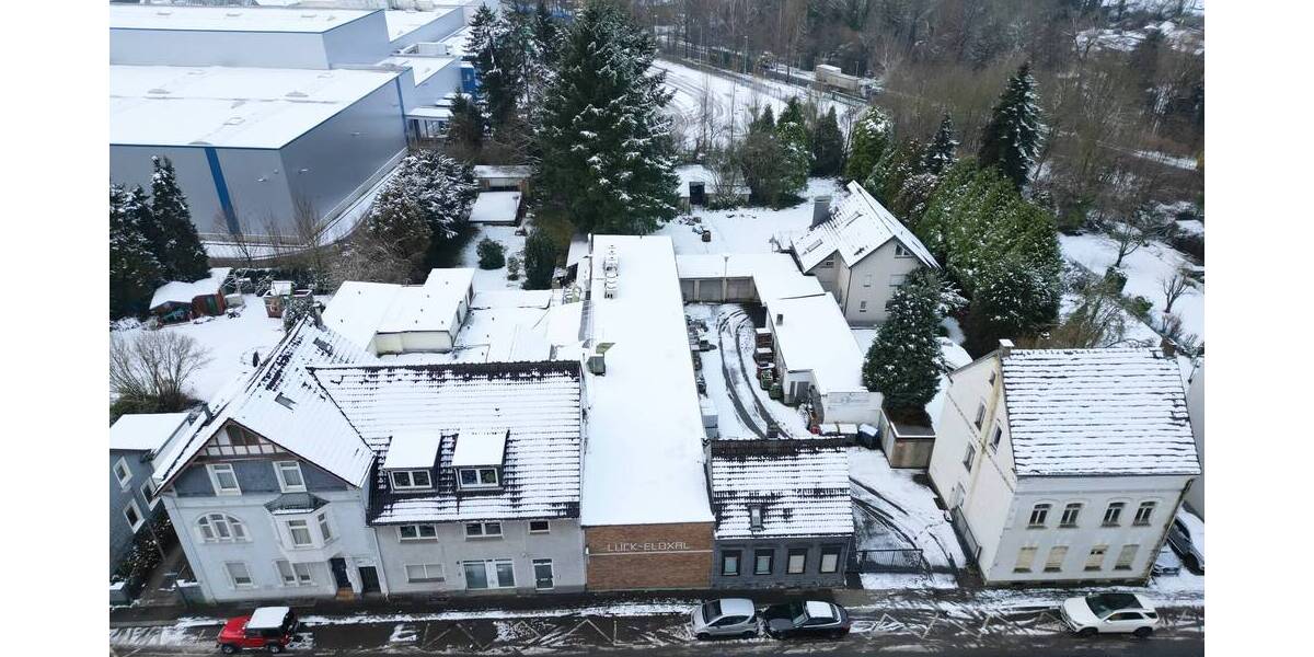 Baugrundstück mit mehreren Wohn- und Gewerbebestandsgebäuden zimmer