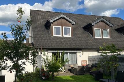 **Großzügiges Reihenhaus mit Garten und Garage in ruhiger Lage von Leverkusen Steinbüchel**
