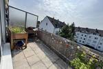 Helle 2 Zimmer Dachgeschoßwohnung mit Balkon und Tiefgaragenplatz