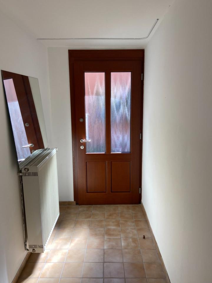 Haus mit großer Dachterrasse, Garten und Garagen in der Altstadt